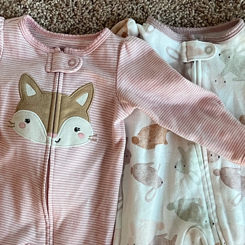 Two newborn outfits.